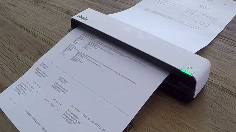 Doxie go portable scanner with documents
