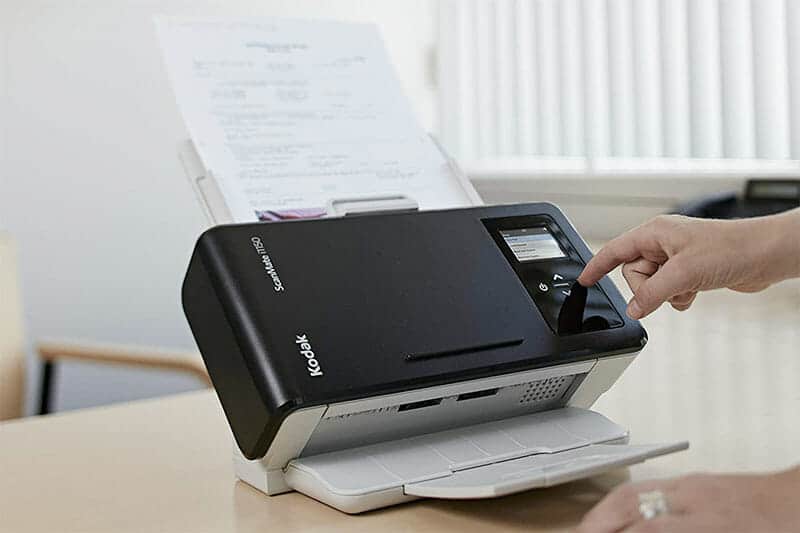 Kodak scanner with a document passing through the feeder
