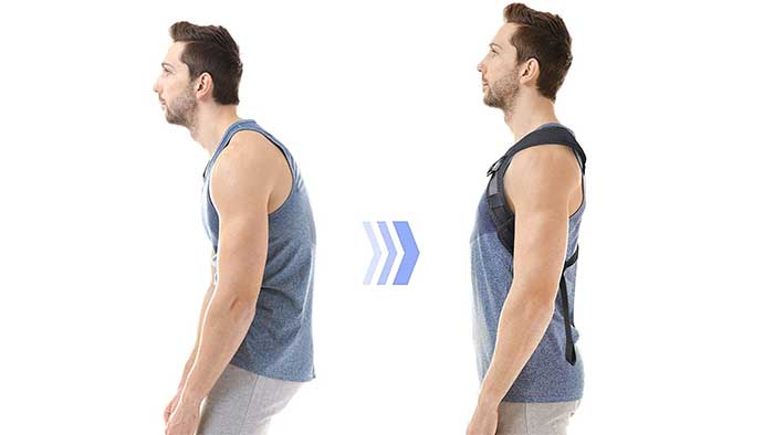 Man correcting his posture whith a back brace