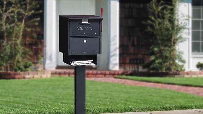 Salsbury industries roadside security mailbox in front of a house
